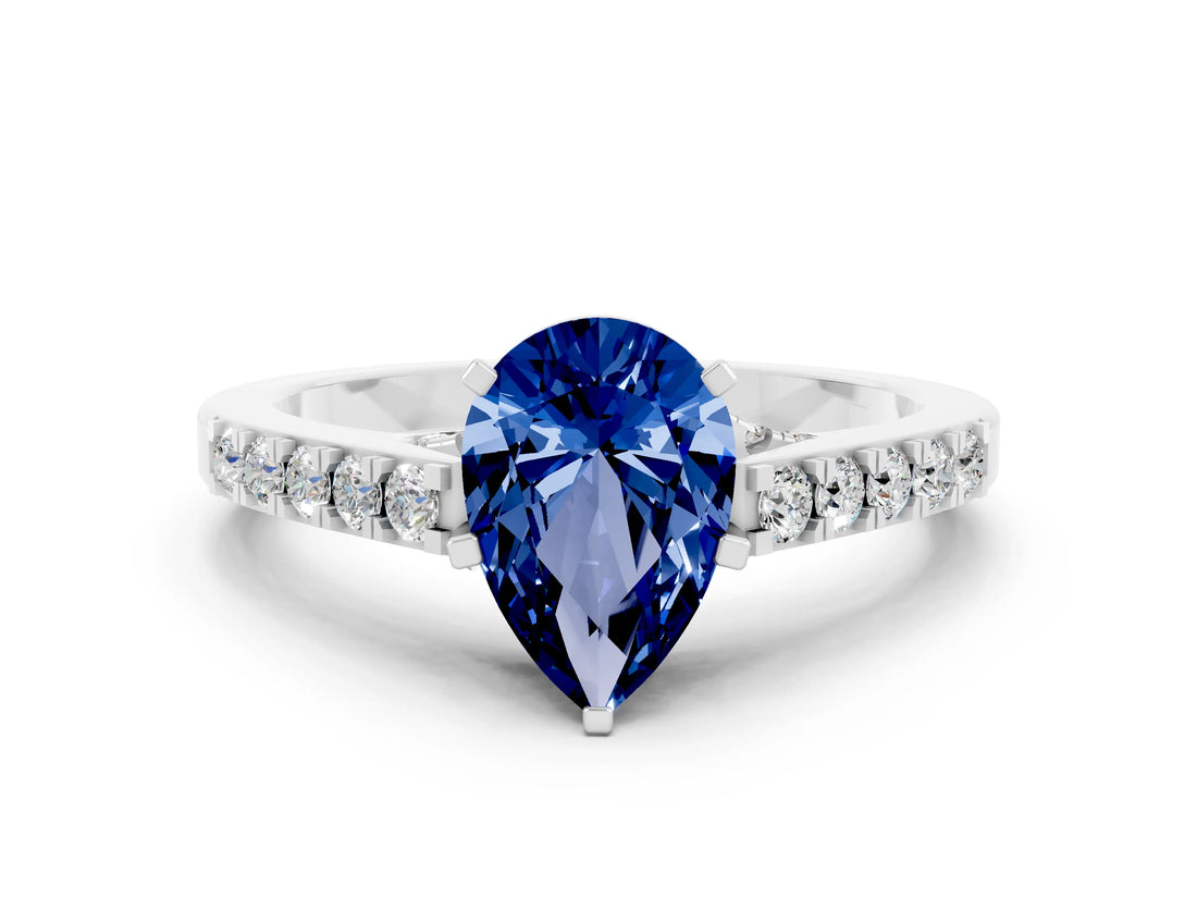 White gold Pear Cut Diamond Solitaire Ring with Pavé Band and Prong Setting