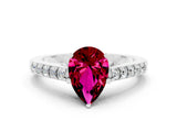 White gold Pear Cut Diamond Solitaire Ring with Pavé Band and Prong Setting