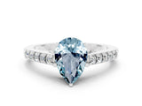 White gold Pear Cut Diamond Solitaire Ring with Pavé Band and Prong Setting