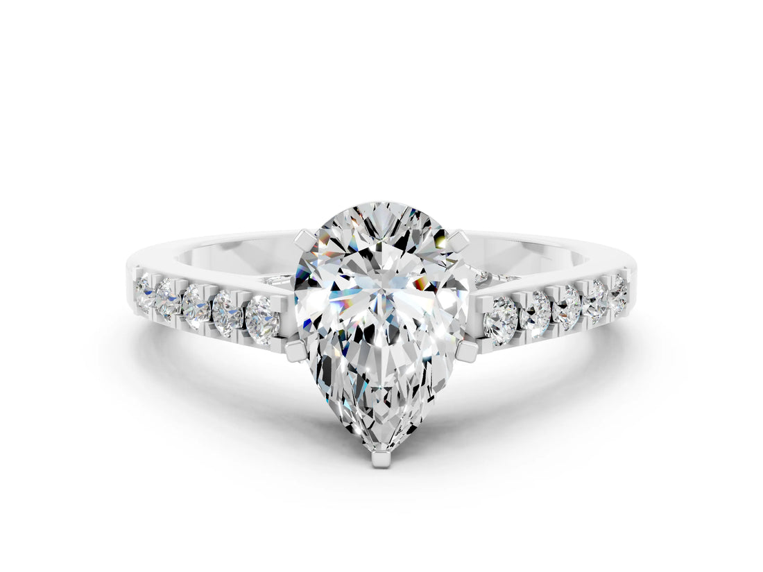 White gold Pear Cut Diamond Solitaire Ring with Pavé Band and Prong Setting