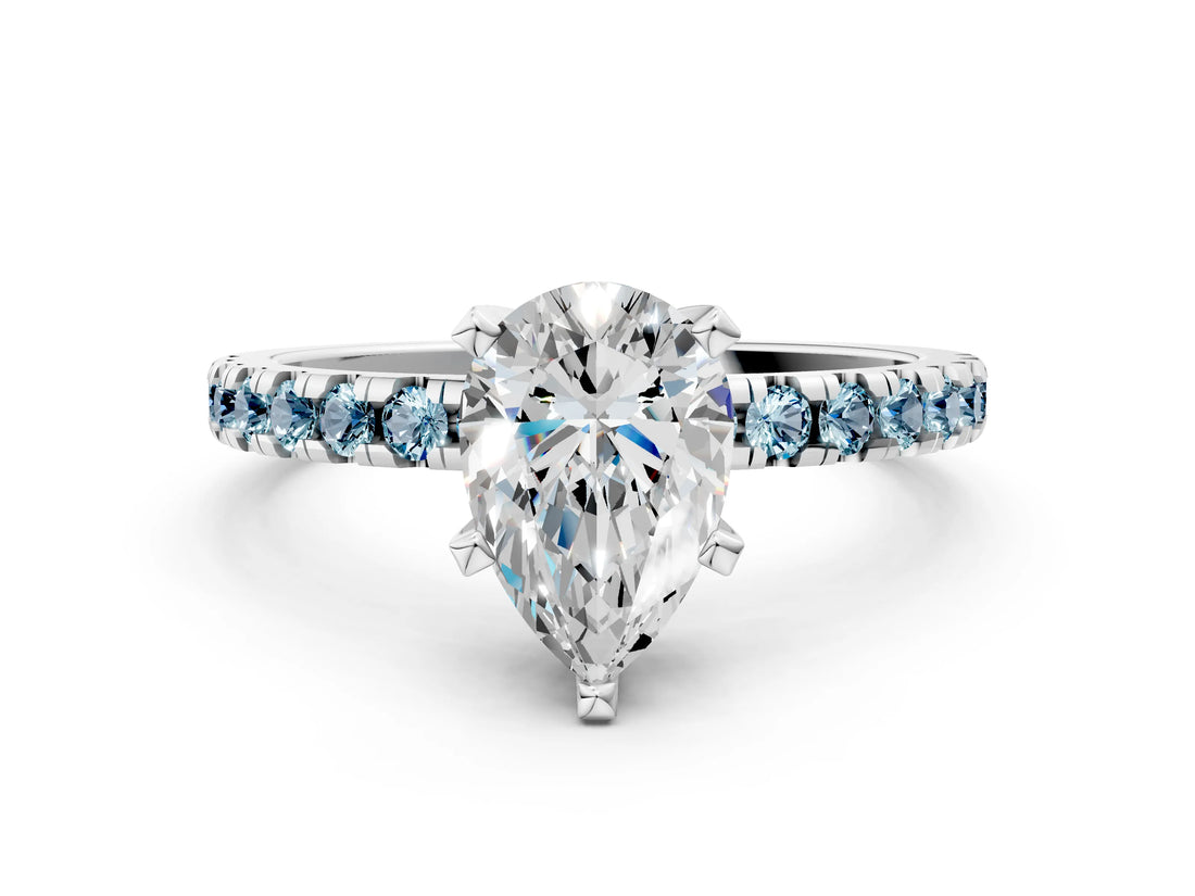 White gold Pear Cut Diamond Solitaire Ring with Round with Aquamarine side stone Pavé Band and Four-Prong Setting_36