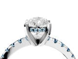 White gold Pear Cut Diamond Solitaire Ring with Round with Aquamarine side stone Pavé Band and Four-Prong Setting_4