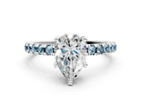 White gold Pear Cut Diamond Solitaire Ring with Round with Aquamarine side stone Pavé Band and Four-Prong Setting