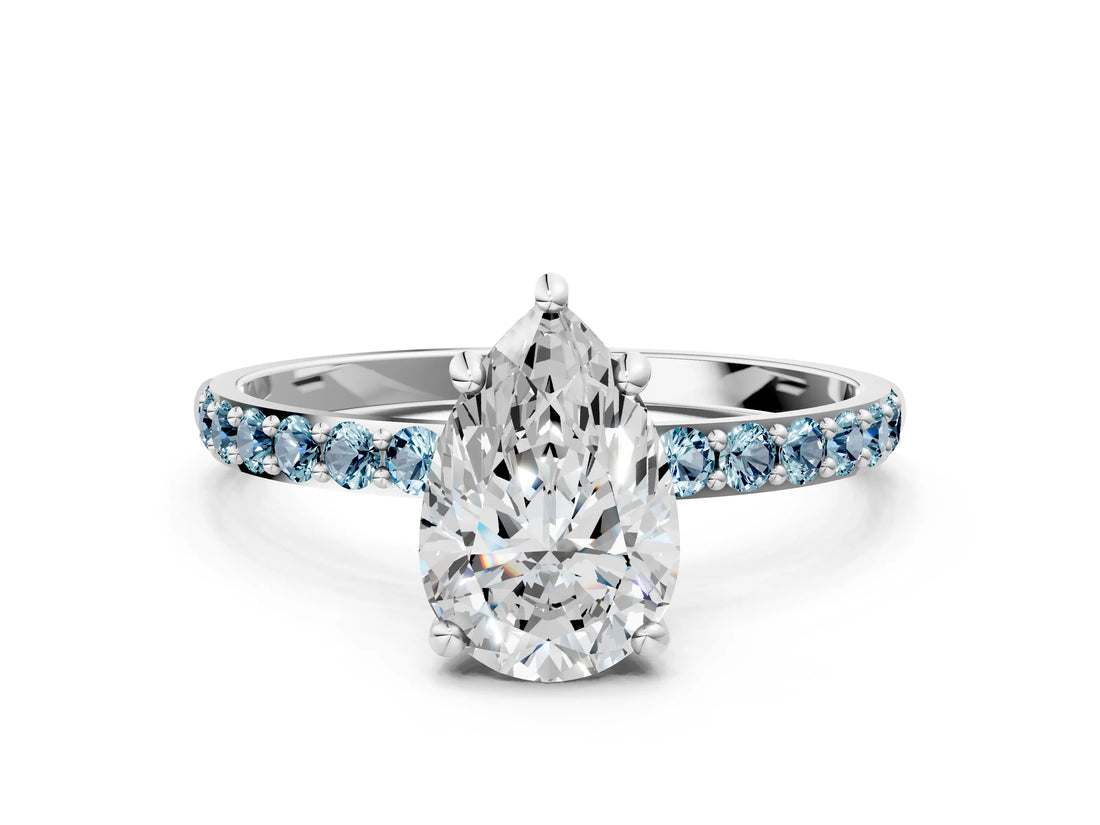 White gold Pear Cut Diamond Solitaire Ring with Round with Aquamarine side stone Pavé Band and Prong Setting_12