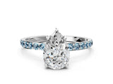 White gold Pear Cut Diamond Solitaire Ring with Round with Aquamarine side stone Pavé Band and Prong Setting_12