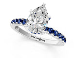 White gold Pear Cut Diamond Solitaire Ring with Round with Blue Sapphire side stone Pavé Band and Four-Prong Setting_37