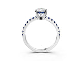White gold Pear Cut Diamond Solitaire Ring with Round with Blue Sapphire side stone Pavé Band and Four-Prong Setting_3