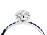 White gold Pear Cut Diamond Solitaire Ring with Round with Blue Sapphire side stone Pavé Band and Prong Setting_16