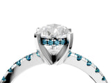 White gold Pear Cut Diamond Solitaire Ring with Round with Blue Topaz side stone Pavé Band and Four-Prong Setting_4