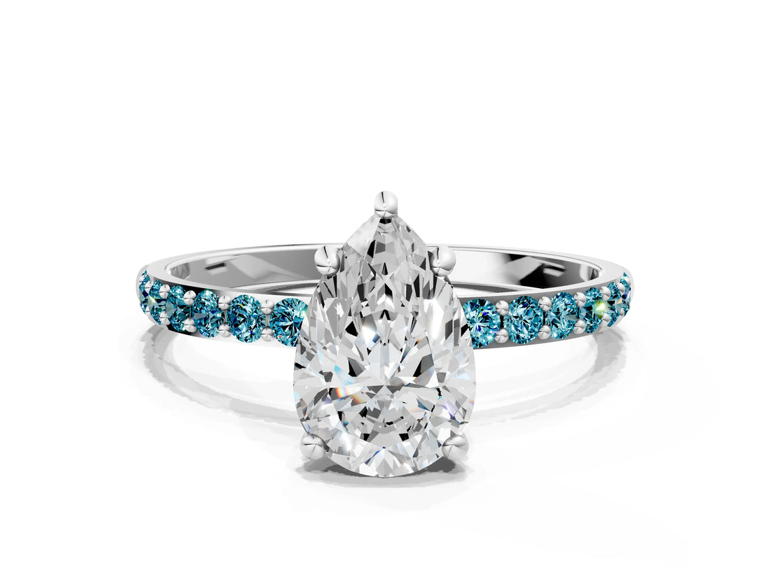 White gold Pear Cut Diamond Solitaire Ring with Round with Blue Topaz side stone Pavé Band and Prong Setting_12