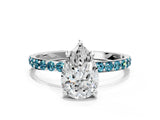 White gold Pear Cut Diamond Solitaire Ring with Round with Blue Topaz side stone Pavé Band and Prong Setting_12