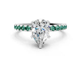 White gold Pear Cut Diamond Solitaire Ring with Round with Green Sapphire side stone Pavé Band and Four-Prong Setting
