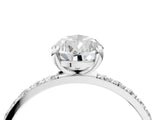 White gold Pear Cut Diamond Solitaire Ring with Round with Moissanite side stone Pavé Band and Prong Setting_16