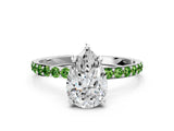 White gold Pear Cut Diamond Solitaire Ring with Round with Peridot side stone Pavé Band and Prong Setting_12