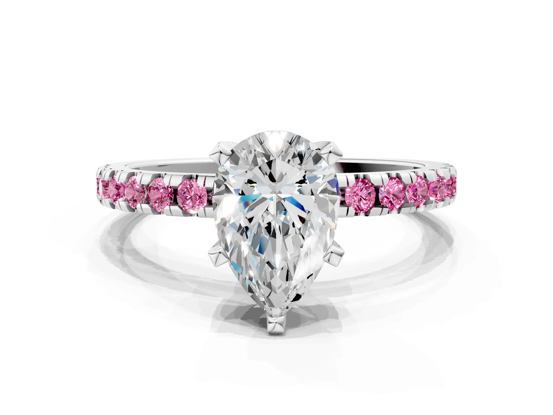 White gold Pear Cut Diamond Solitaire Ring with Round with Pink Sapphire side stone Pavé Band and Four-Prong Setting