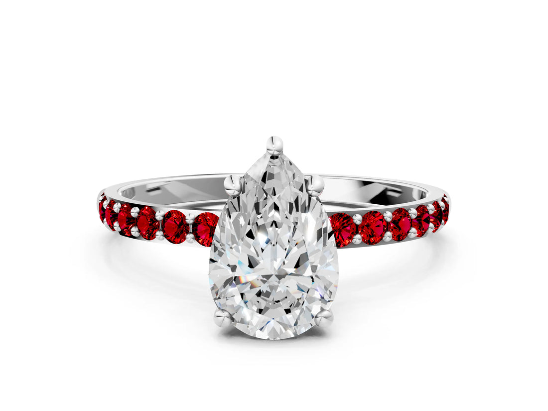 White gold Pear Cut Diamond Solitaire Ring with Round with Ruby side stone Pavé Band and Prong Setting_24
