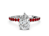 White gold Pear Cut Diamond Solitaire Ring with Round with Ruby side stone Pavé Band and Prong Setting_36