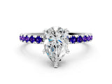 White gold Pear Cut Diamond Solitaire Ring with Round with Tanzanite side stone Pavé Band and Four-Prong Setting
