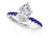 White gold Pear Cut Diamond Solitaire Ring with Round with Tanzanite side stone Pavé Band and Four-Prong Setting_13