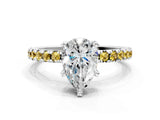 White gold Pear Cut Diamond Solitaire Ring with Round with Yellow Sapphire side stone Pavé Band and Four-Prong Setting