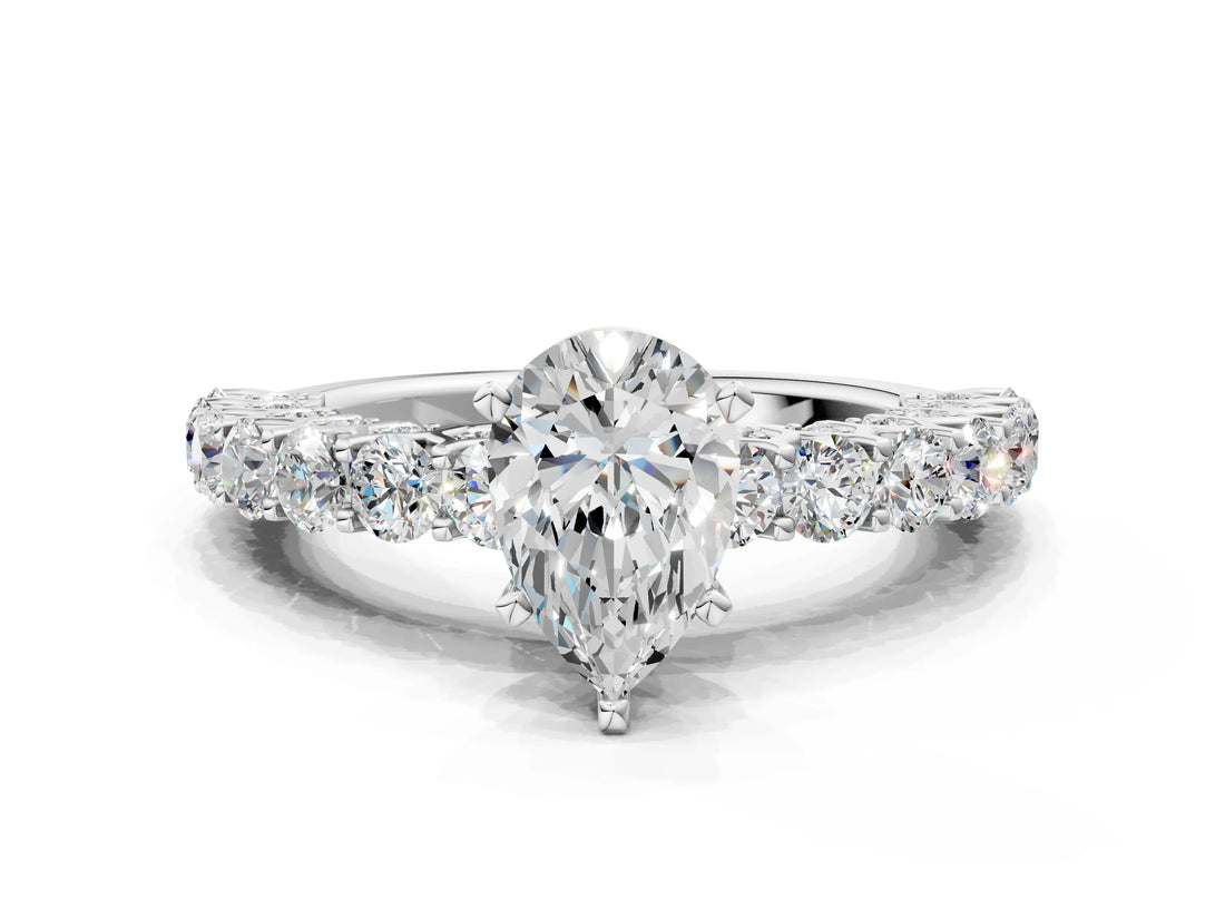 White gold Pear Cut Diamond Solitaire Ring with Shared Prong Pavé Band and Four-Prong Setting_124