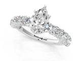 White gold Pear Cut Diamond Solitaire Ring with Shared Prong Pavé Band and Four-Prong Setting_125
