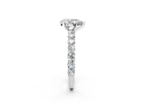 White gold Pear Cut Diamond Solitaire Ring with Shared Prong Pavé Band and Four-Prong Setting_126