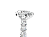 White gold Pear Cut Diamond Solitaire Ring with Shared Prong Pavé Band and Four-Prong Setting_129