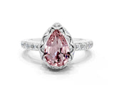 White gold Pear Cut Diamond Solitaire Ring with Shared Prong Pavé Band