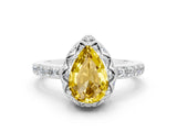 White gold Pear Cut Diamond Solitaire Ring with Shared Prong Pavé Band