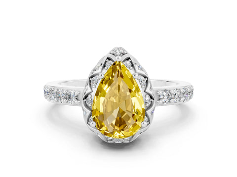 White gold Pear Cut Diamond Solitaire Ring with Shared Prong Pavé Band