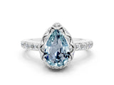 White gold Pear Cut Diamond Solitaire Ring with Shared Prong Pavé Band