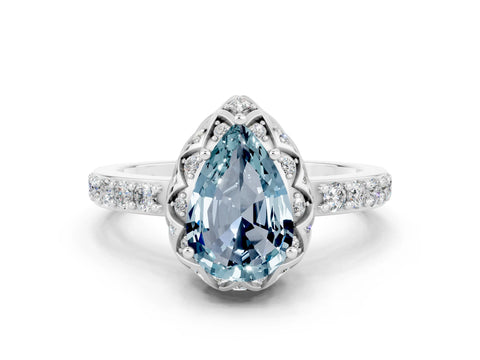 White gold Pear Cut Diamond Solitaire Ring with Shared Prong Pavé Band