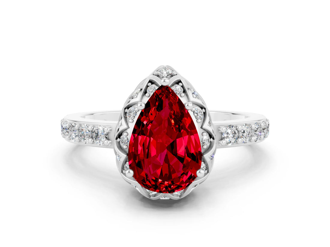 White gold Pear Cut Diamond Solitaire Ring with Shared Prong Pavé Band
