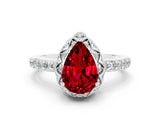 White gold Pear Cut Diamond Solitaire Ring with Shared Prong Pavé Band