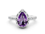 White gold Pear Cut Diamond Solitaire Ring with Shared Prong Pavé Band