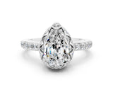 White gold Pear Cut Diamond Solitaire Ring with Shared Prong Pavé Band