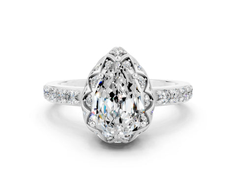 White gold Pear Cut Diamond Solitaire Ring with Shared Prong Pavé Band