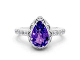 White gold Pear Cut Diamond Solitaire Ring with Shared Prong Pavé Band