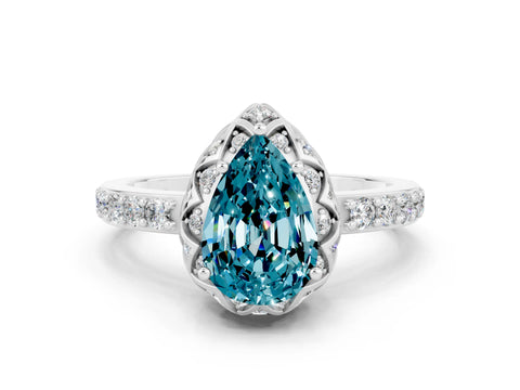 White gold Pear Cut Diamond Solitaire Ring with Shared Prong Pavé Band