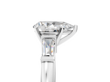 White gold Pear Cut Diamond Solitaire Ring with Tapered Baguette Accents and Six-Prong Setting_94