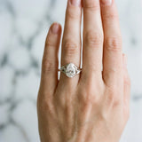 White gold Pear Cut Diamond Solitaire Ring with Twist Band and Four-Prong Setting_109