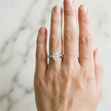 White gold Pear Cut Diamond Solitaire Ring with Twisted Band and Pavé Accents_57