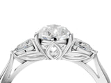White gold Pear Cut Diamond Three-Stone Ring with Pear Side Stones and Four-Prong Setting_98
