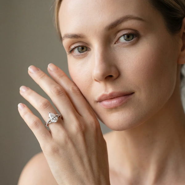 White gold Pear Cut Diamond Twisted Band Engagement Ring with Prong Setting