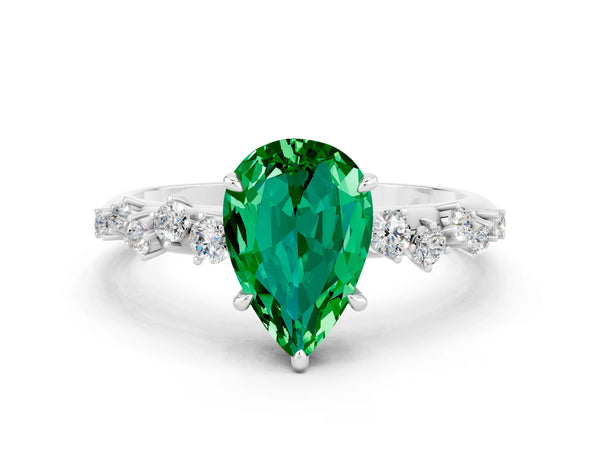 White gold Pear Cut Emerald Cluster Side Stone Solitaire Ring with Prong Setting