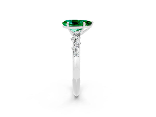 Platinum Pear Cut Emerald Cluster Side Stone Solitaire Ring with Prong Setting