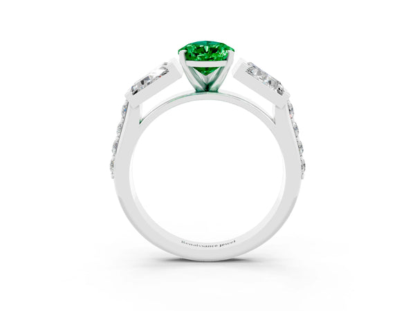 Platinum Pear Cut Emerald Engagement Ring with Baguette Side Stones and Channel Set Band