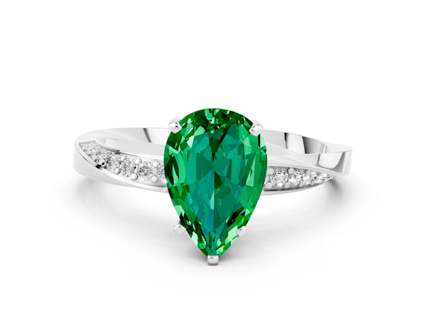 White gold Pear Cut Emerald Engagement Ring with Side Stone Accents and Four-Prong Setting