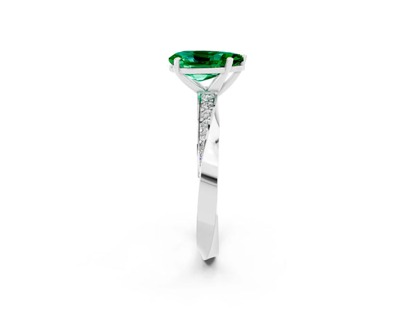 White gold Pear Cut Emerald Engagement Ring with Side Stone Accents and Four-Prong Setting